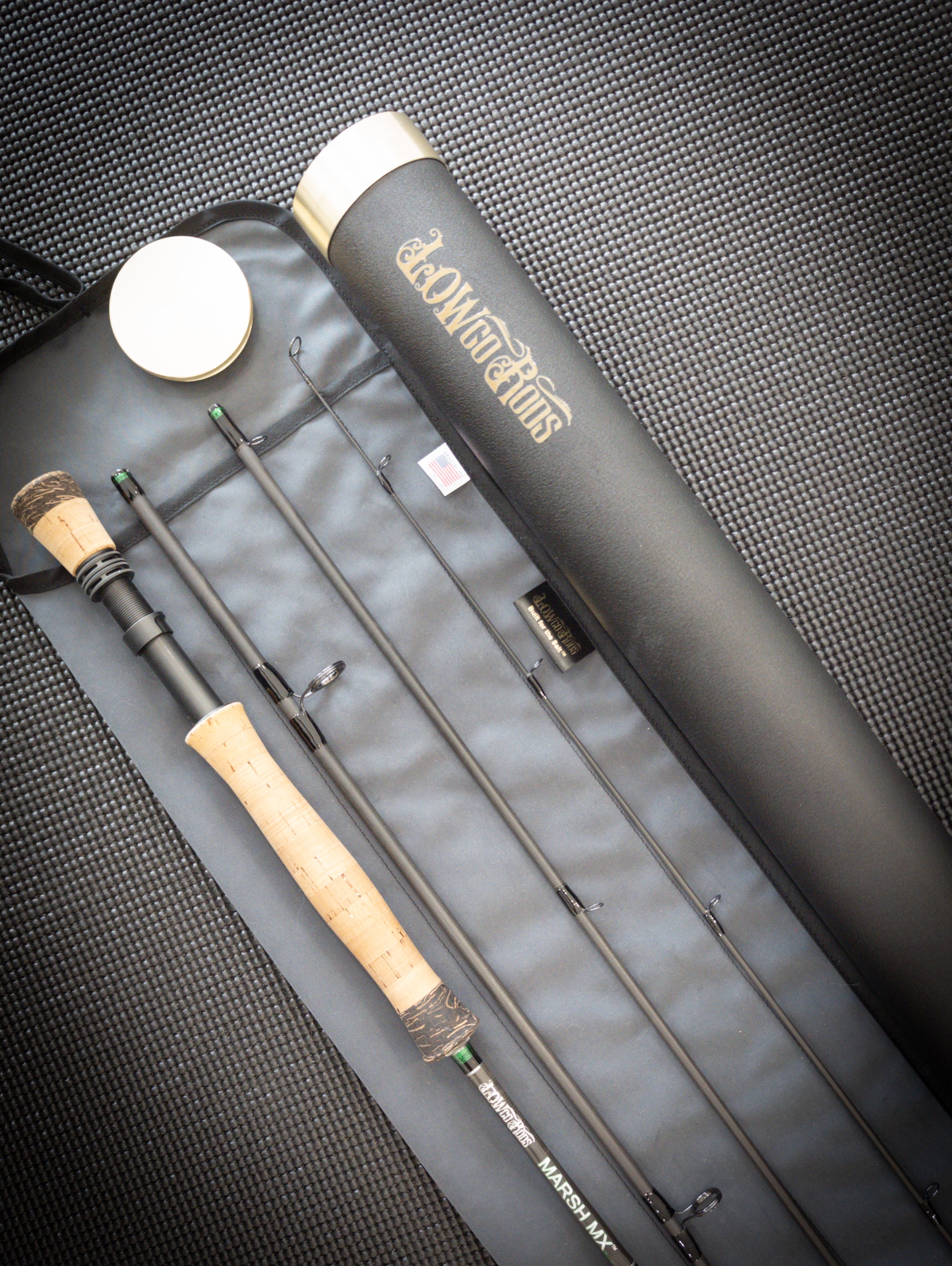 Saltwater fly rod with rod bag and rod tube